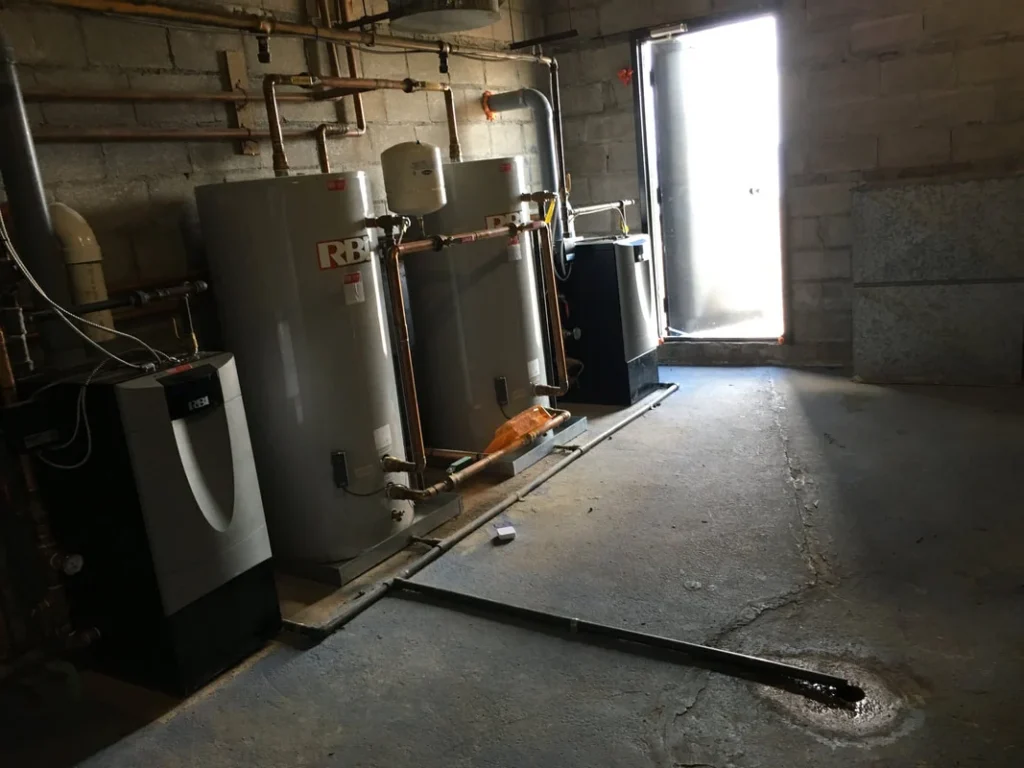 Tanks, mechanical equipment and pipework in a utility room